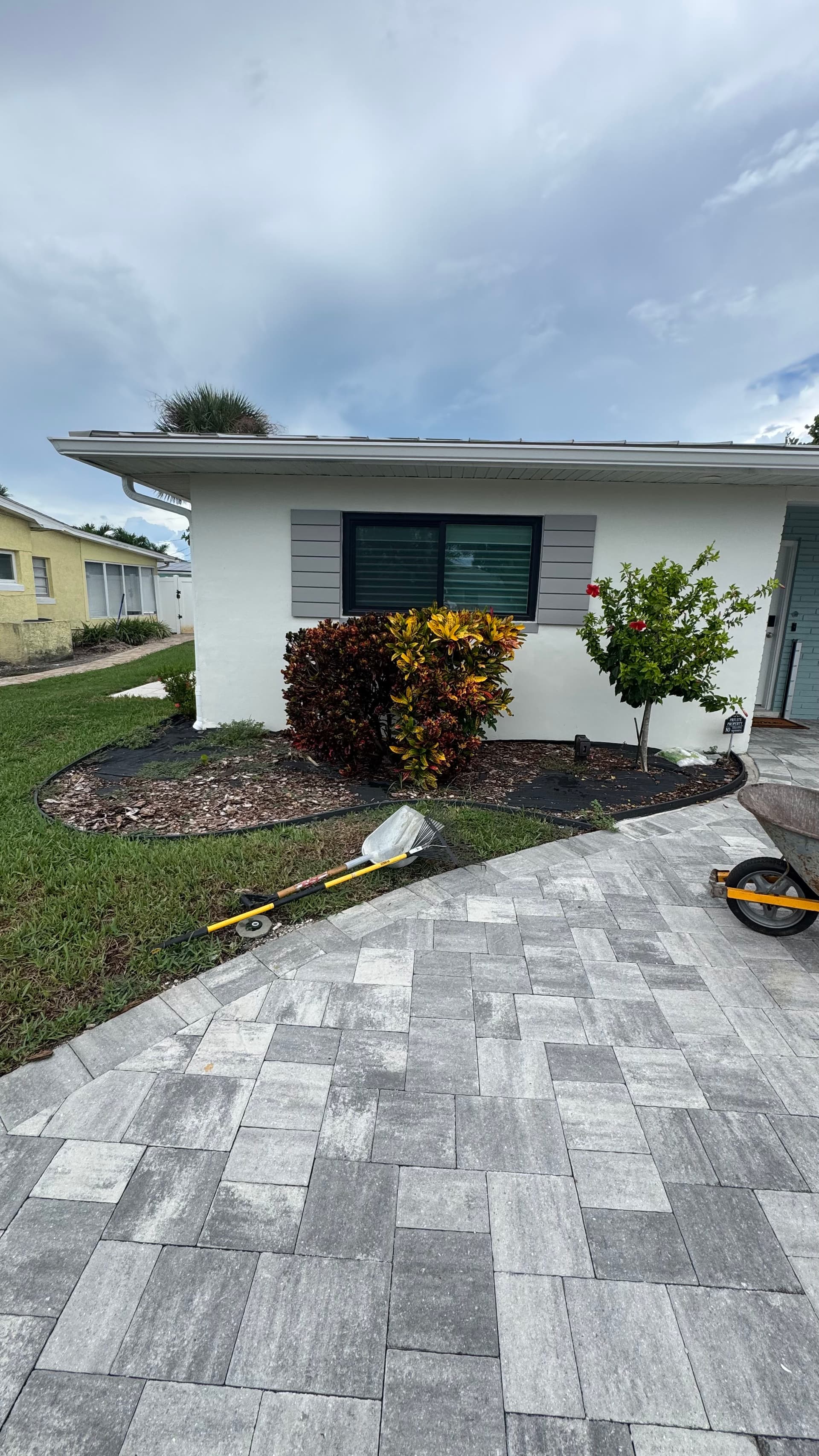 Gallery photos for Front Yard Upgrade With Palms, Ixora, and Caribbean Beach Pebbles: Image #2