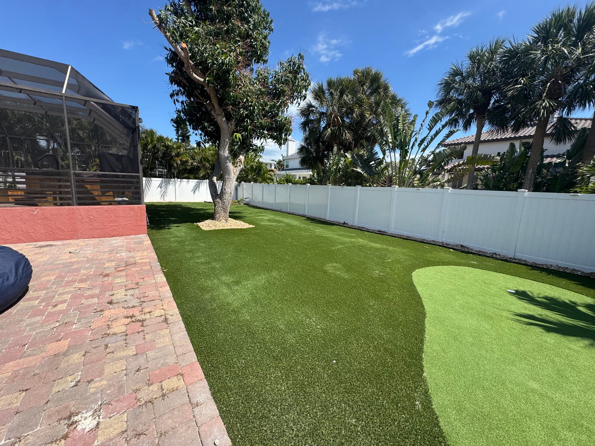 Gallery photos for Patchy Backyard Gets Artificial Turf and a Custom Putting Green: Image #1