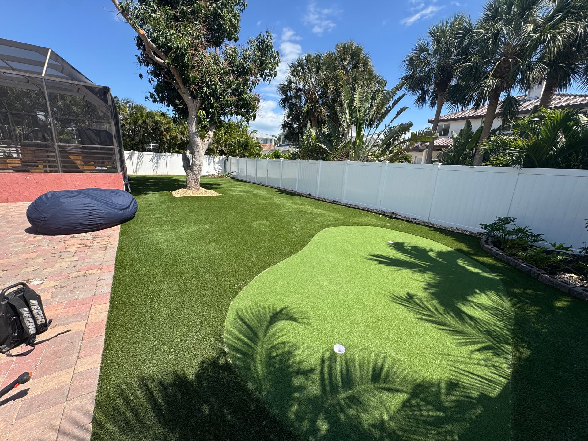 Gallery photos for Patchy Backyard Gets Artificial Turf and a Custom Putting Green: Image #2