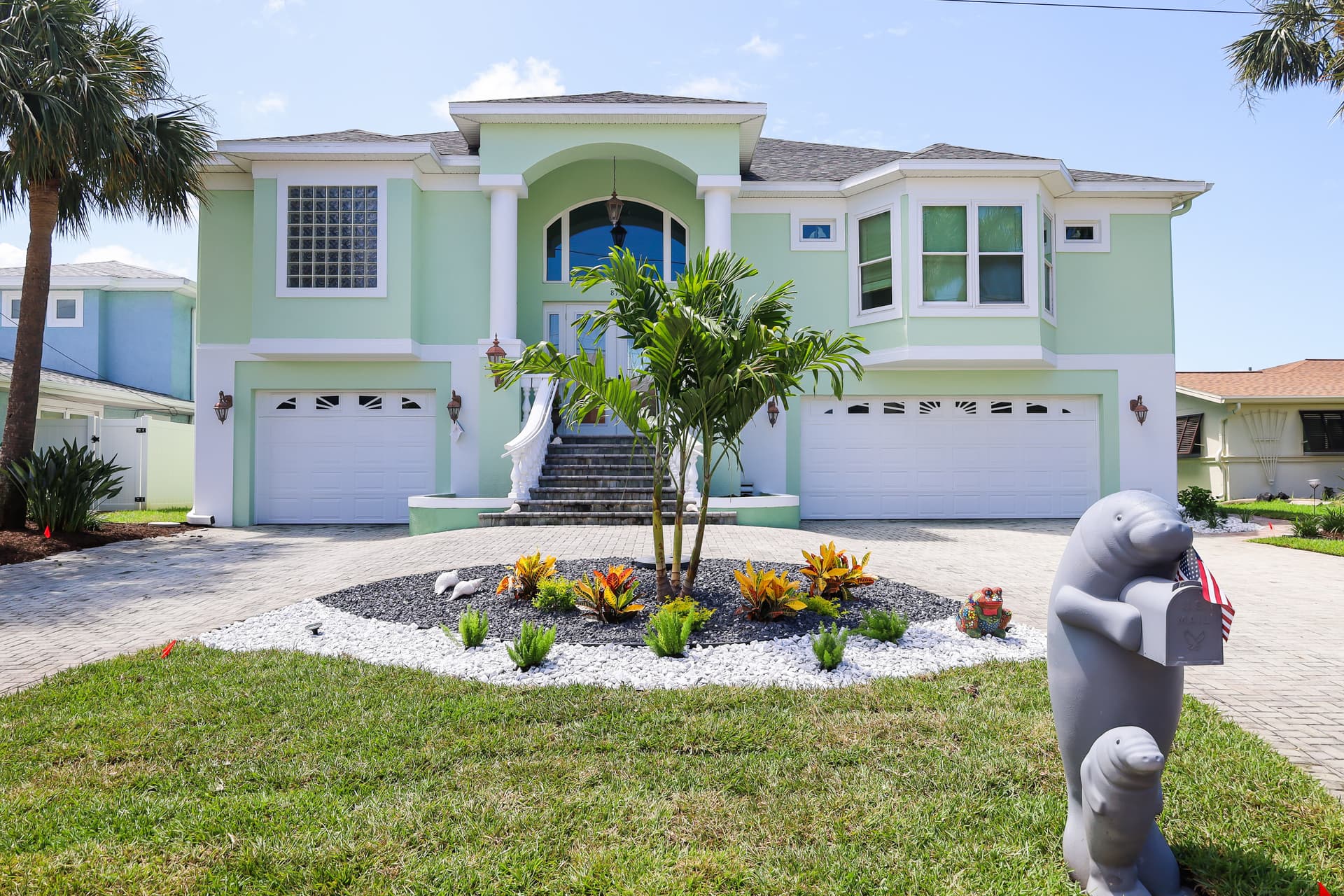 Full Property Landscape Makeover with New Sod, Plants, and Rock image