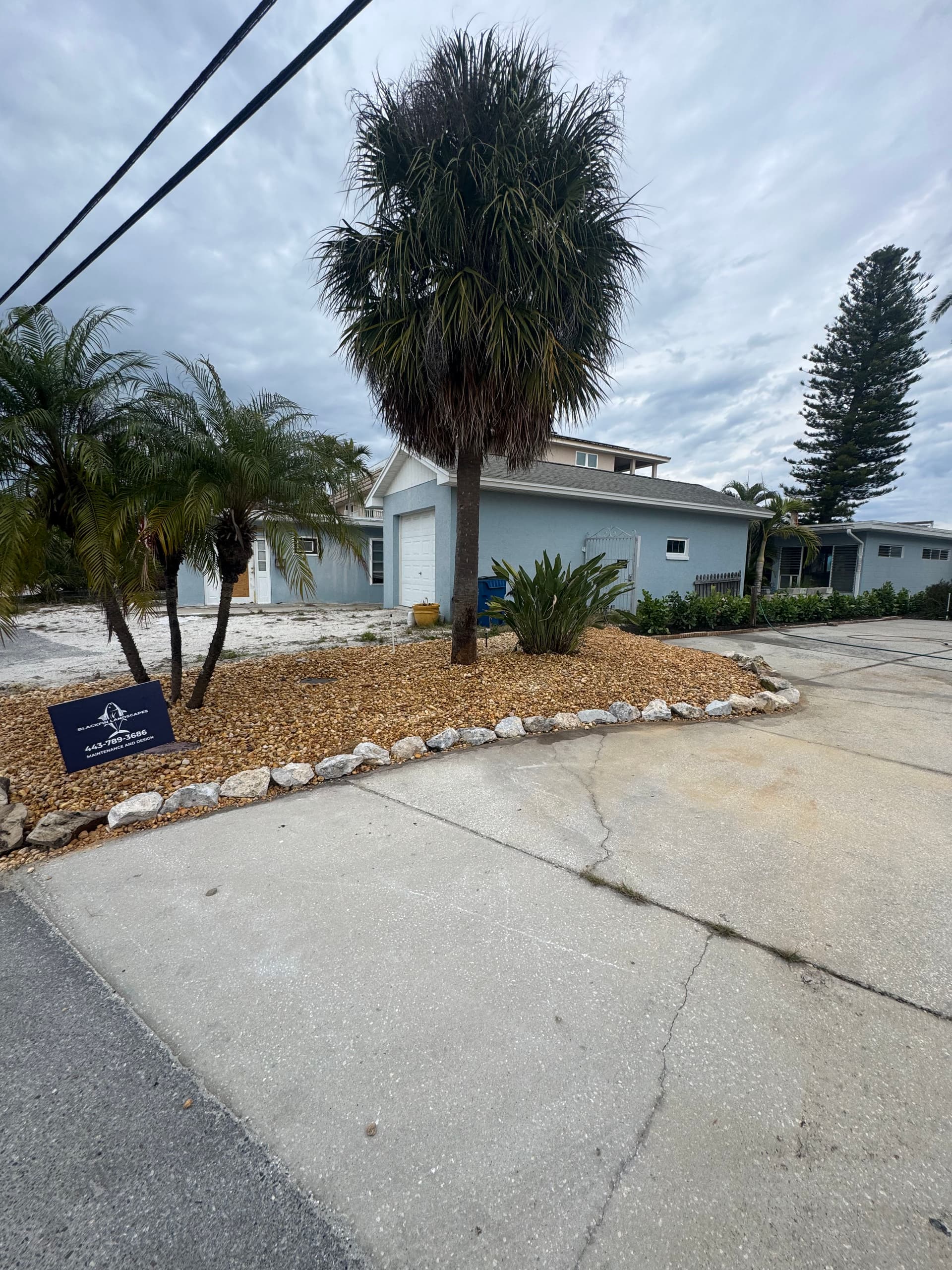 Front Yard Rock and Mulch Install That Actually Adds Privacy image