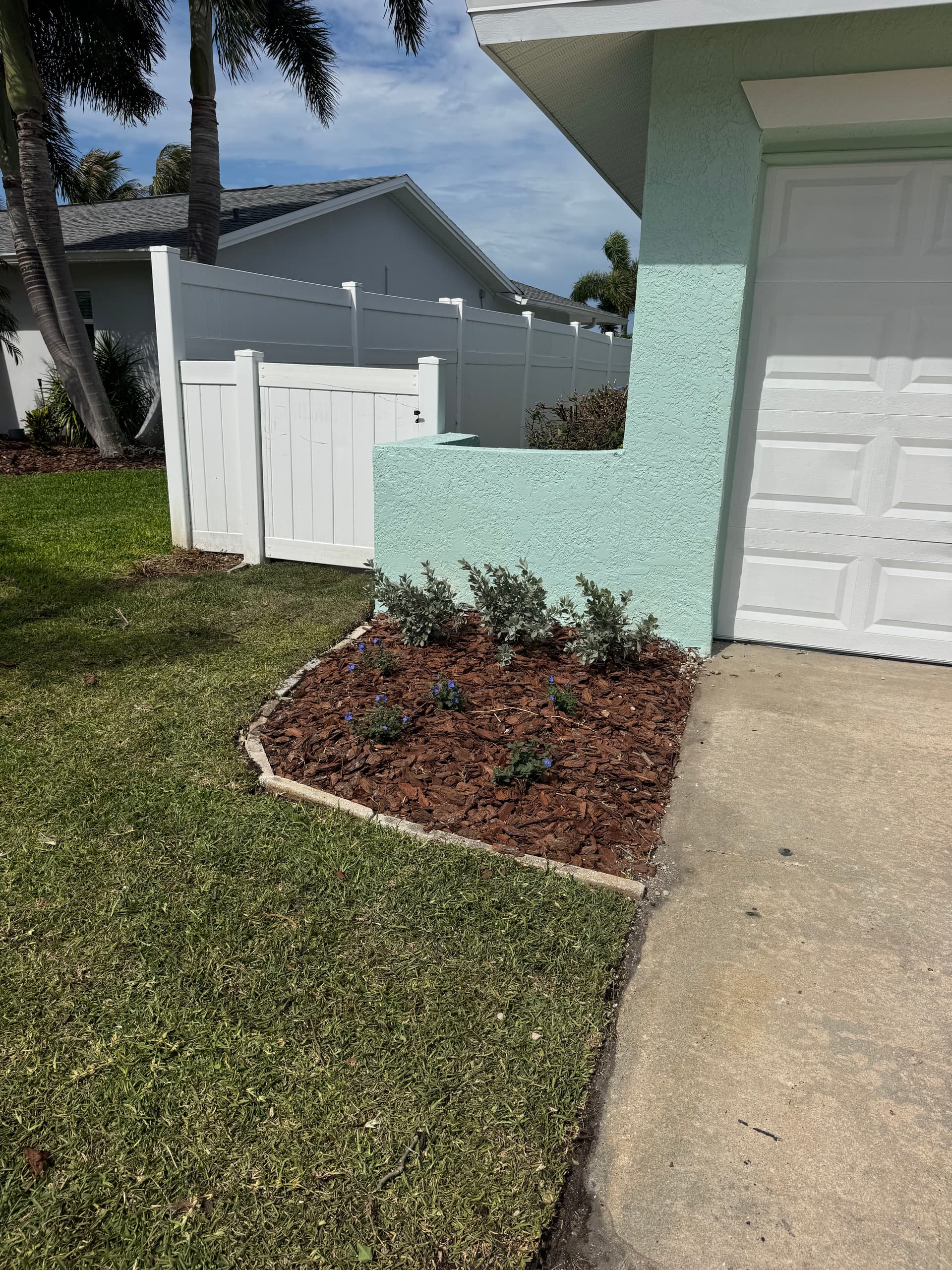 Gallery photos for Fresh Mulch, New Plants, and Sod Give This Front Yard New Life: Image #2