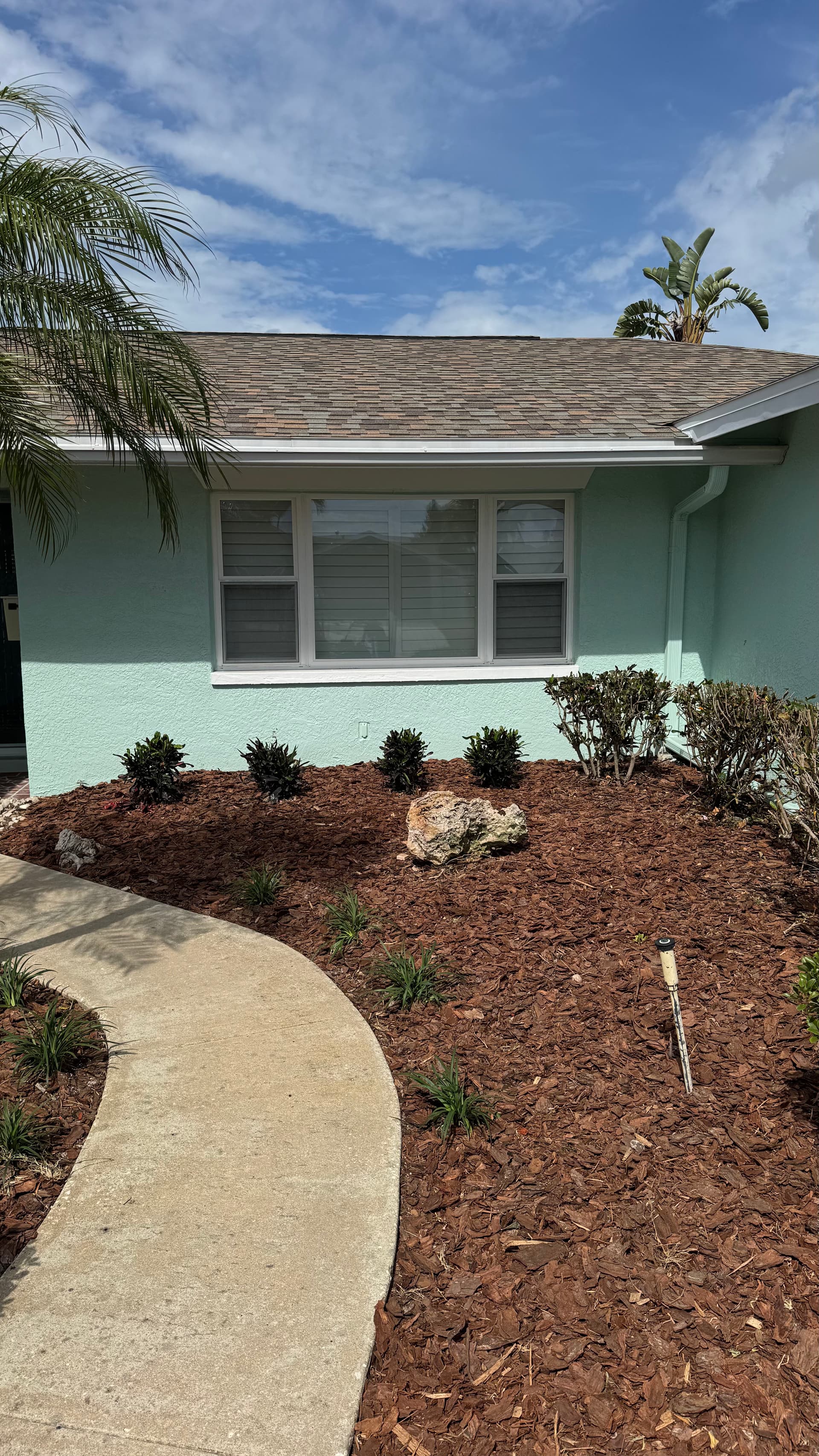 Gallery photos for Fresh Mulch, New Plants, and Sod Give This Front Yard New Life: Image #1